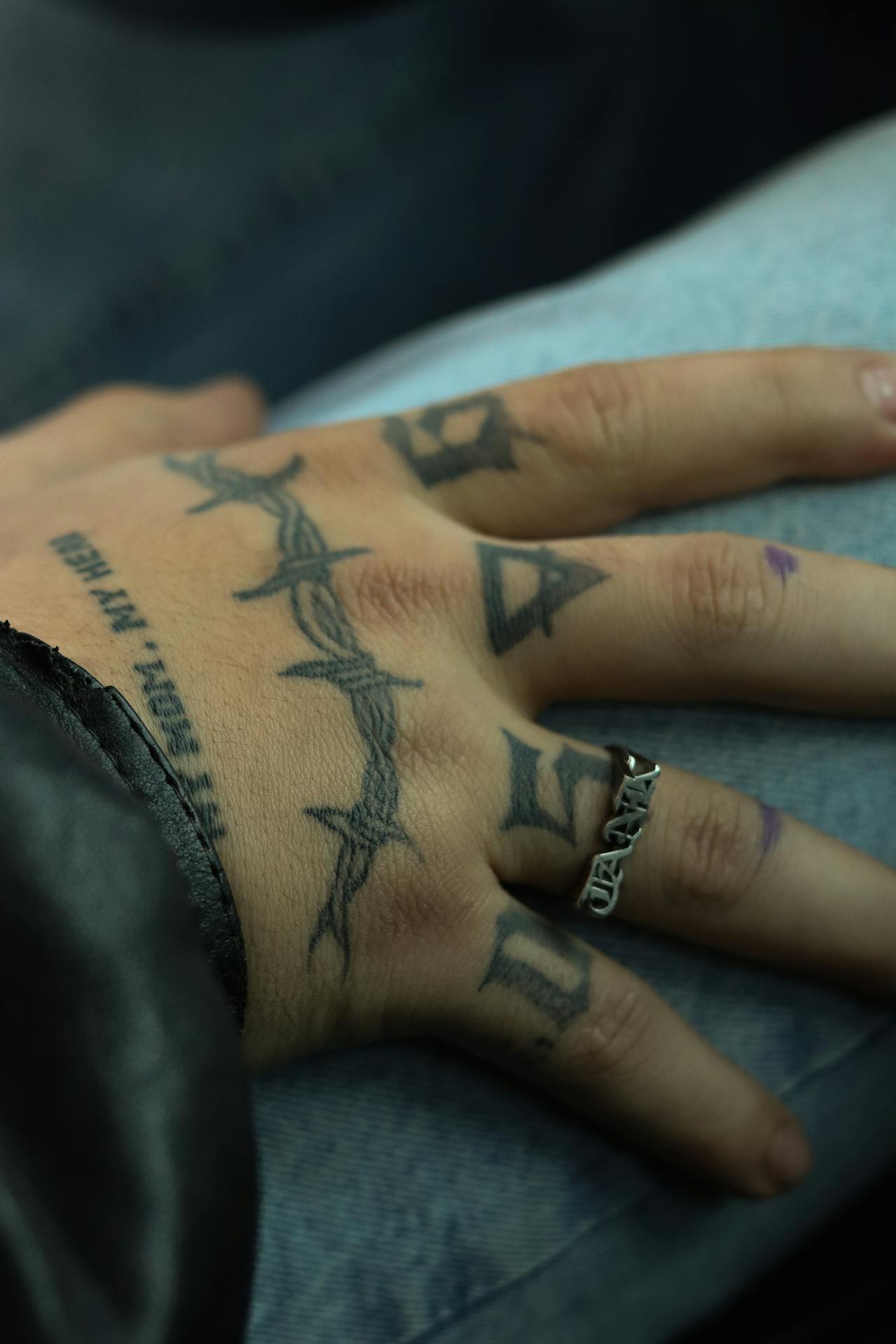 Hand tattoos with ring