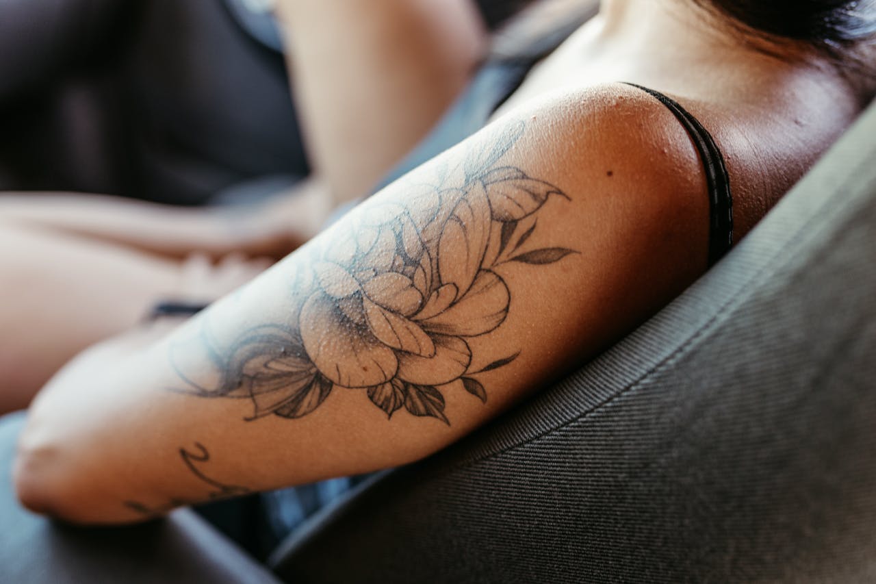 Floral arm tattoo